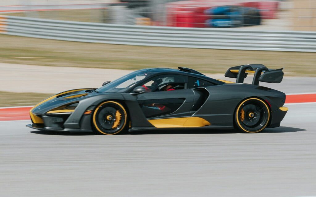 McLaren Senna hypercar with its distinctive rear wing on track