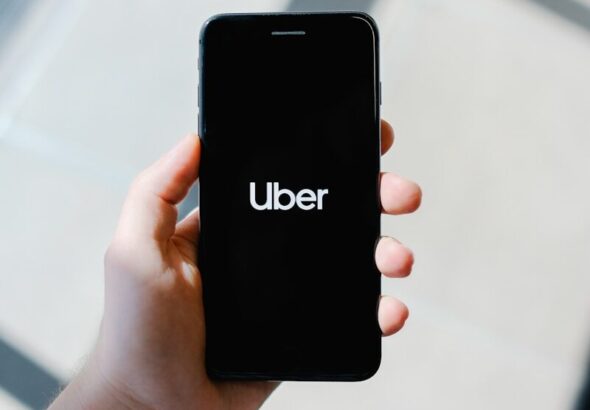 person holding black iphone 5