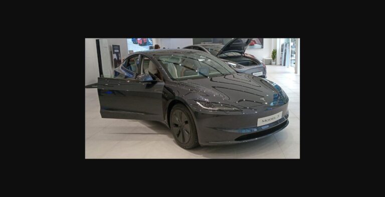 2025 Tesla Model 3 Long Range on display at a Tesla store