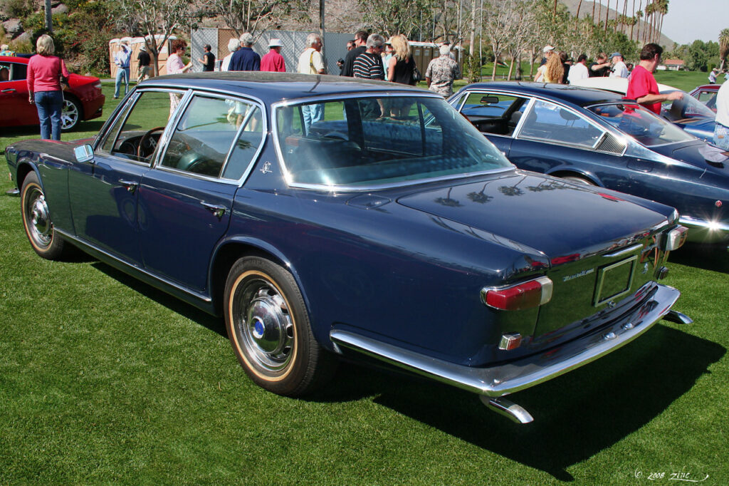 Rear three-quarter view of a dark blue 1967 Maserati Quattroporte Series II sedan