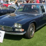 Dark blue 1967 Maserati Quattroporte Series II, the sedan behind the Maserati Quattroporte fire truck conversion