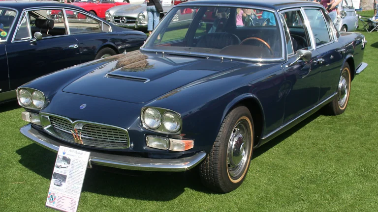 Dark blue 1967 Maserati Quattroporte Series II, the sedan behind the Maserati Quattroporte fire truck conversion