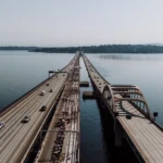 Aerial shot of a floating bridge linking Seattle across Lake Washington.
