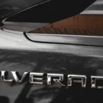 Close-up of a Chevrolet Silverado tailgate badge and rear window
