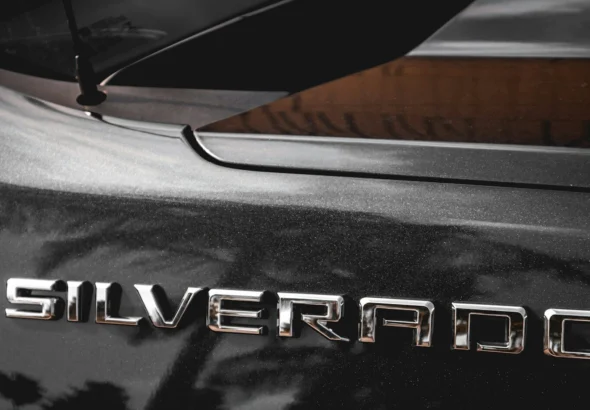 Close-up of a Chevrolet Silverado tailgate badge and rear window
