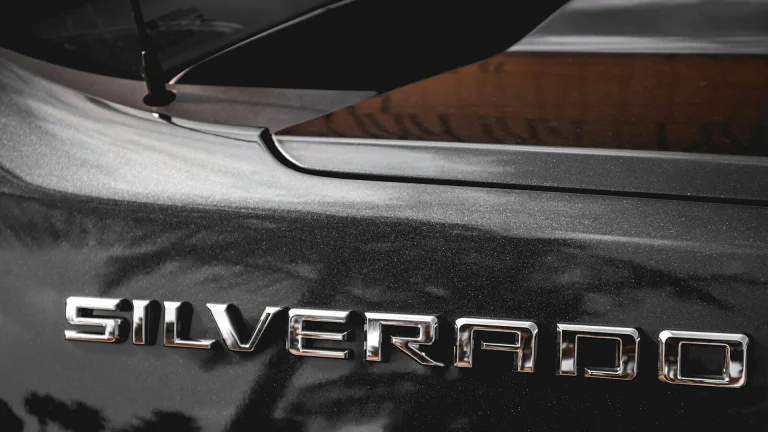 Close-up of a Chevrolet Silverado tailgate badge and rear window