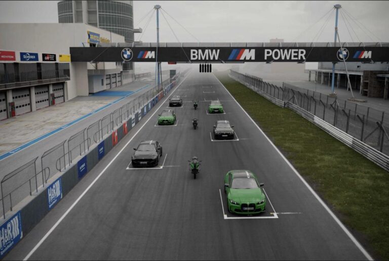 BMW Edition 100 Jahre Nürburgring line-up of M cars and M motorcycles on the Grand Prix circuit