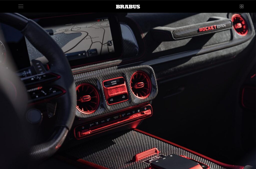 Carbon-fiber dashboard trim and ROCKET RED vents inside the BRABUS 900 ROCKET EDITION CABRIO
