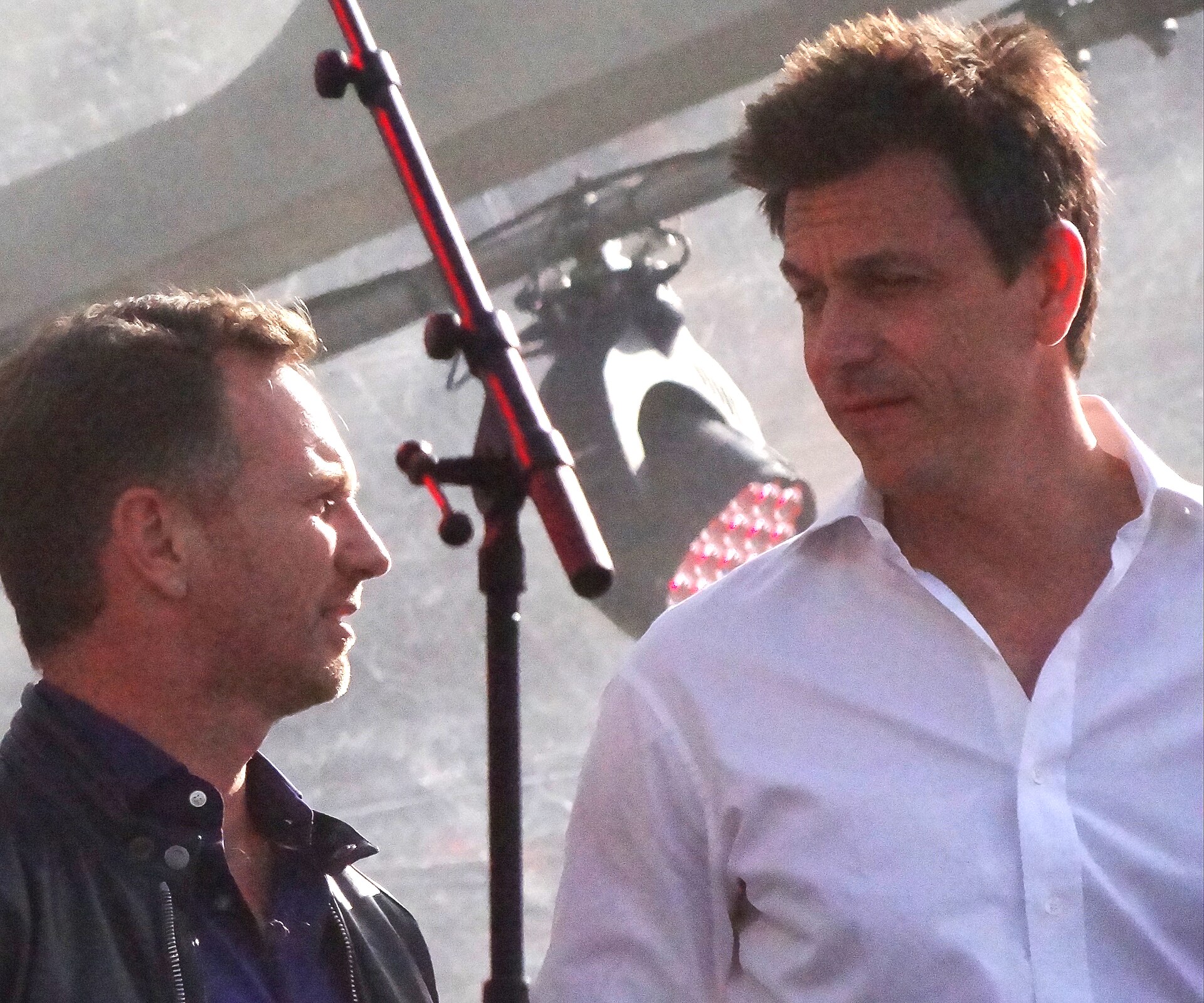 Christian Horner and Toto Wolff standing together on stage at F1 Live in London in July 2017