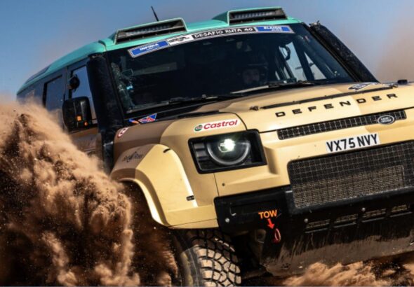 Defender D7X-R rally-raid race car throwing sand in the desert ahead of the 2026 Rallye du Maroc