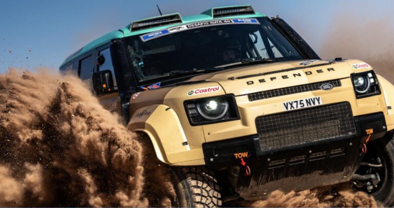 Defender D7X-R rally-raid race car throwing sand in the desert ahead of the 2026 Rallye du Maroc