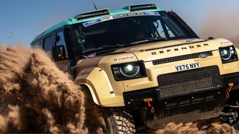 Defender D7X-R rally-raid race car throwing sand in the desert ahead of the 2026 Rallye du Maroc