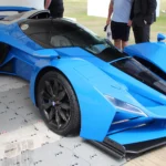 Blue Delage D12 hypercar, the modern revival of the French marque, on display at a car show
