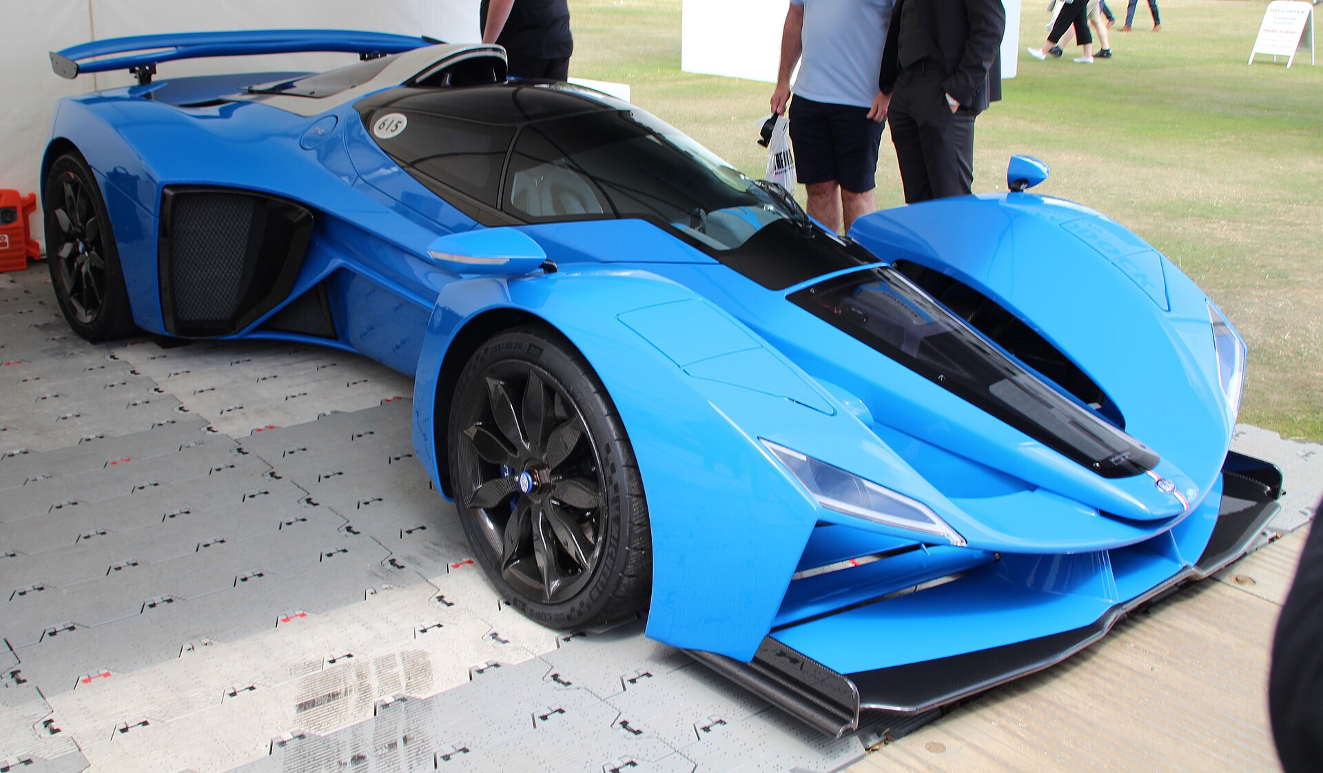 Blue Delage D12 hypercar, the modern revival of the French marque, on display at a car show