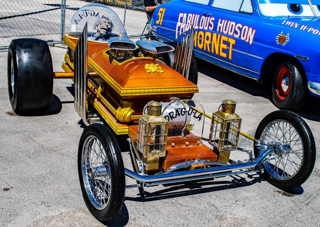 A Drag-U-La coffin dragster with organ-pipe exhausts at the 2018 Viva Las Vegas Rockabilly Weekend car show