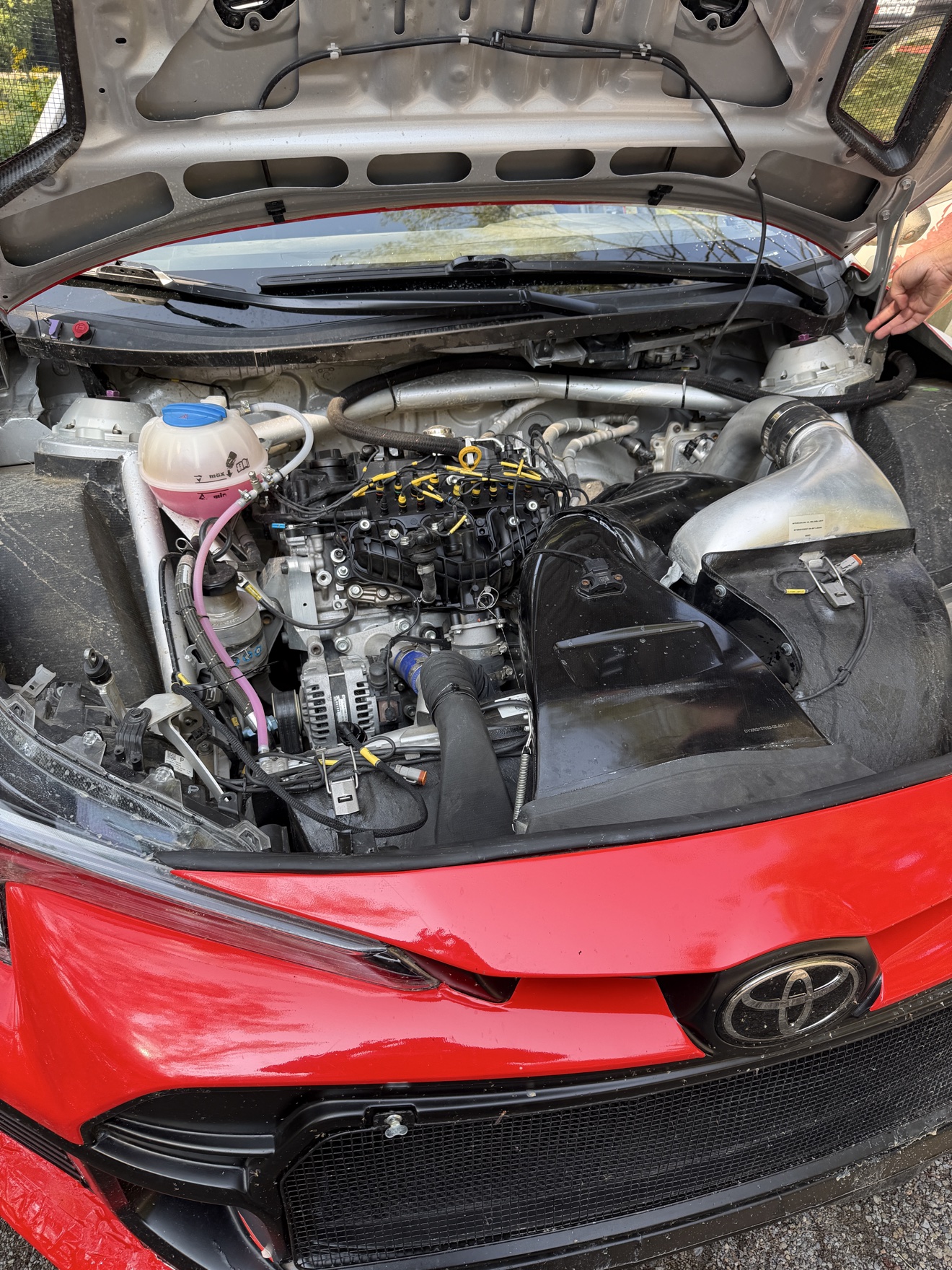 The turbocharged 1.6-liter three-cylinder G16E-GTS rally engine