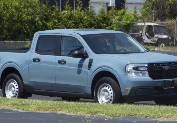 A 2022 Ford Maverick XL in Area 51 blue, the compact unibody pickup Tucci Hot Rods is fitting with a twin-turbo Coyote V8