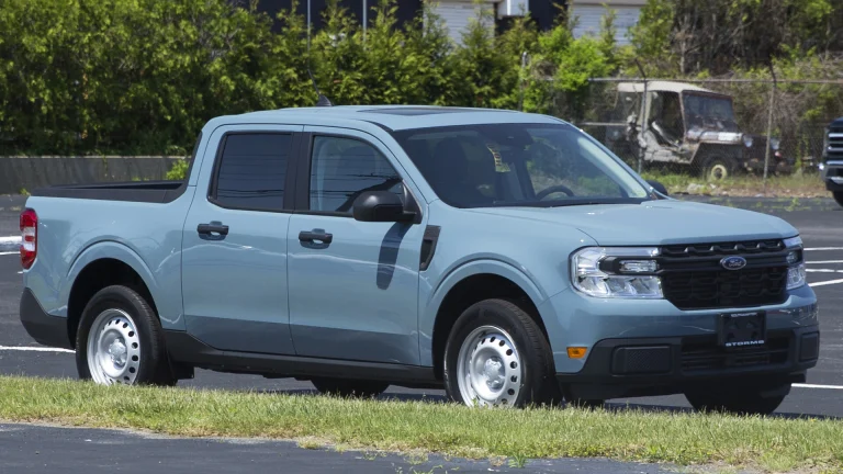 A 2022 Ford Maverick XL in Area 51 blue, the compact unibody pickup Tucci Hot Rods is fitting with a twin-turbo Coyote V8