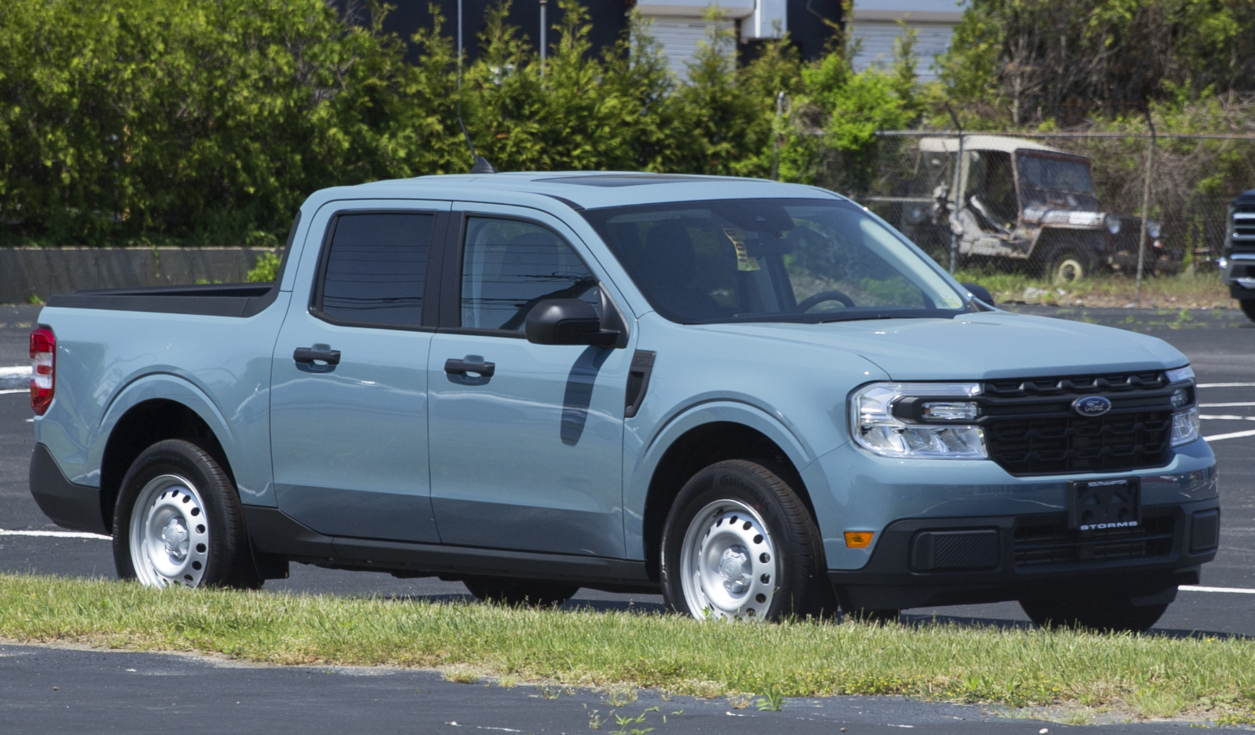A 2022 Ford Maverick XL in Area 51 blue, the compact unibody pickup Tucci Hot Rods is fitting with a twin-turbo Coyote V8