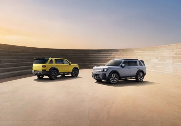 FREELANDER 8 SUVs in yellow and silver on the launch stage backdrop ahead of the brand's Abu Dhabi debut