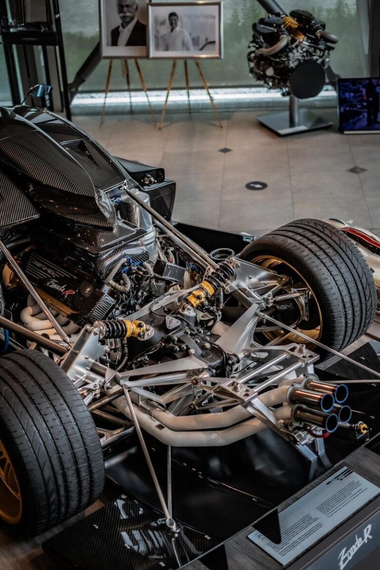 Bare race car chassis under construction in a race shop, similar to the build stages for a Gen3 Supercars tub