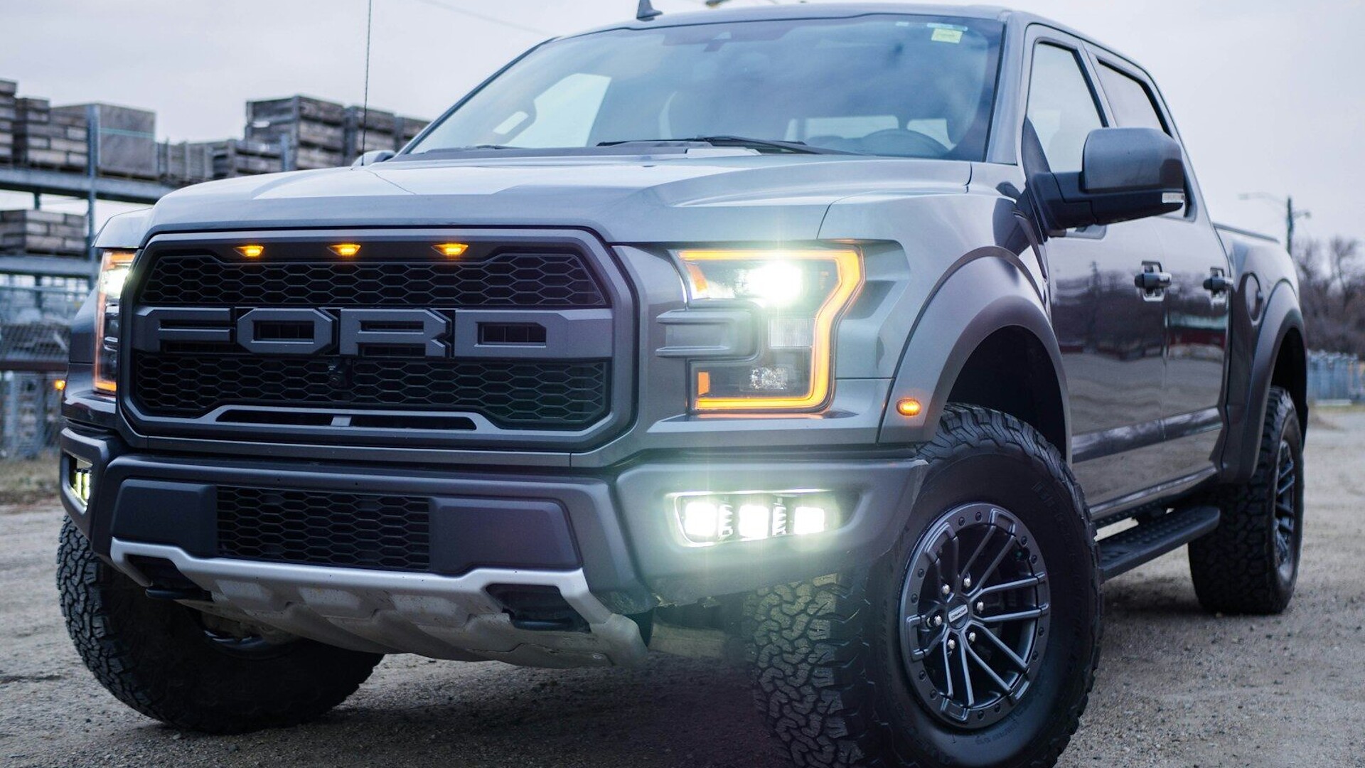 black chevrolet crew cab pickup truck on road during daytime