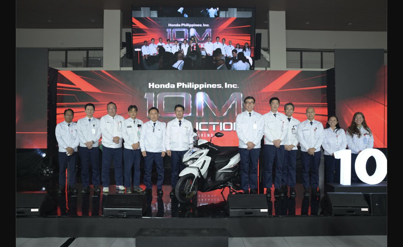 Honda Philippines executives and staff pose with the 10-millionth motorcycle, a Click125 Smart Edition, at the Batangas production ceremony