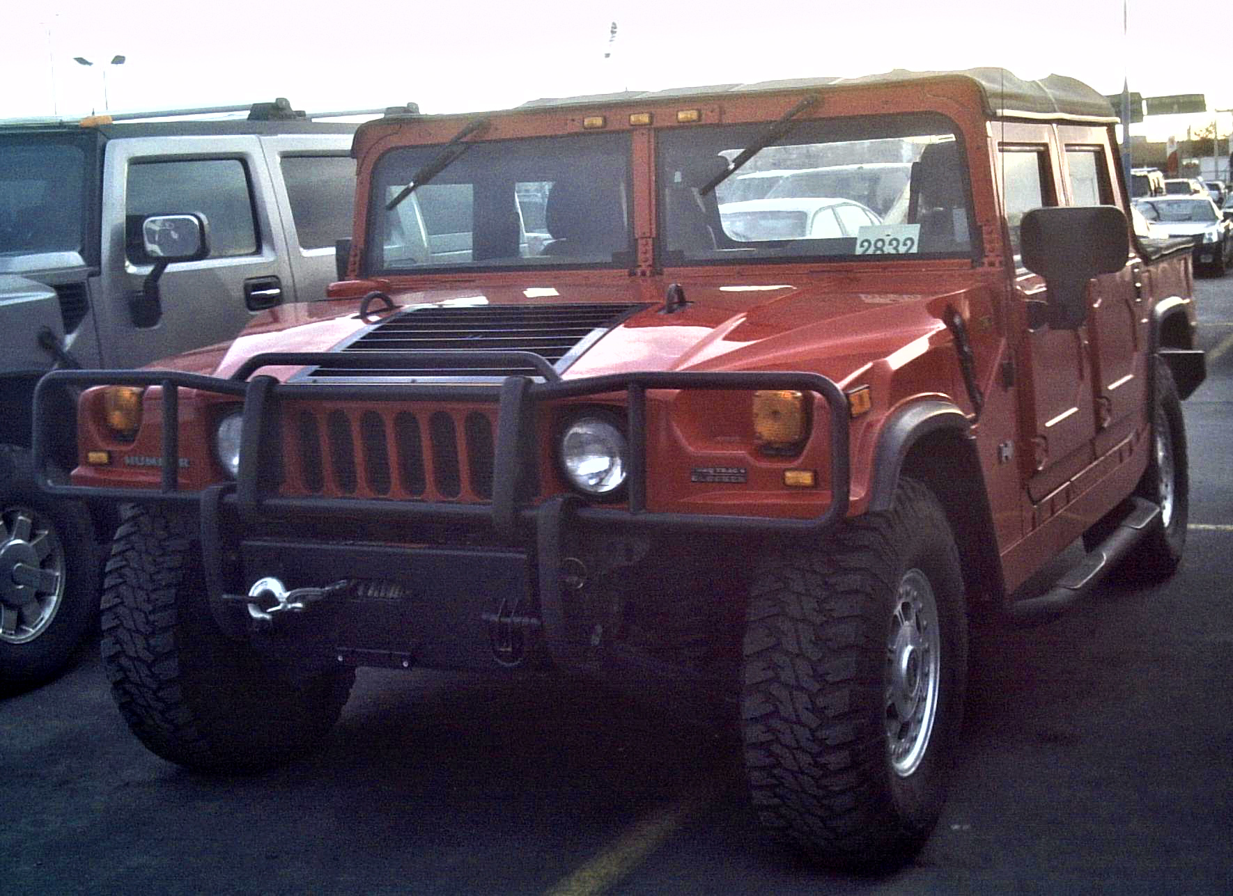 Stock Hummer H1 parked in a lot