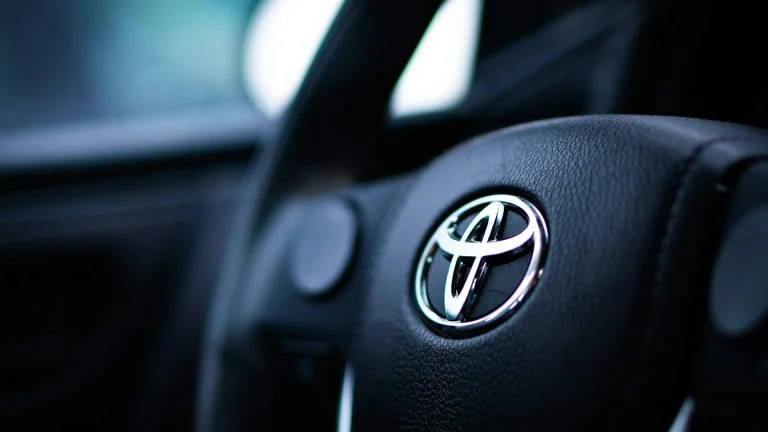 black toyota car steering wheel