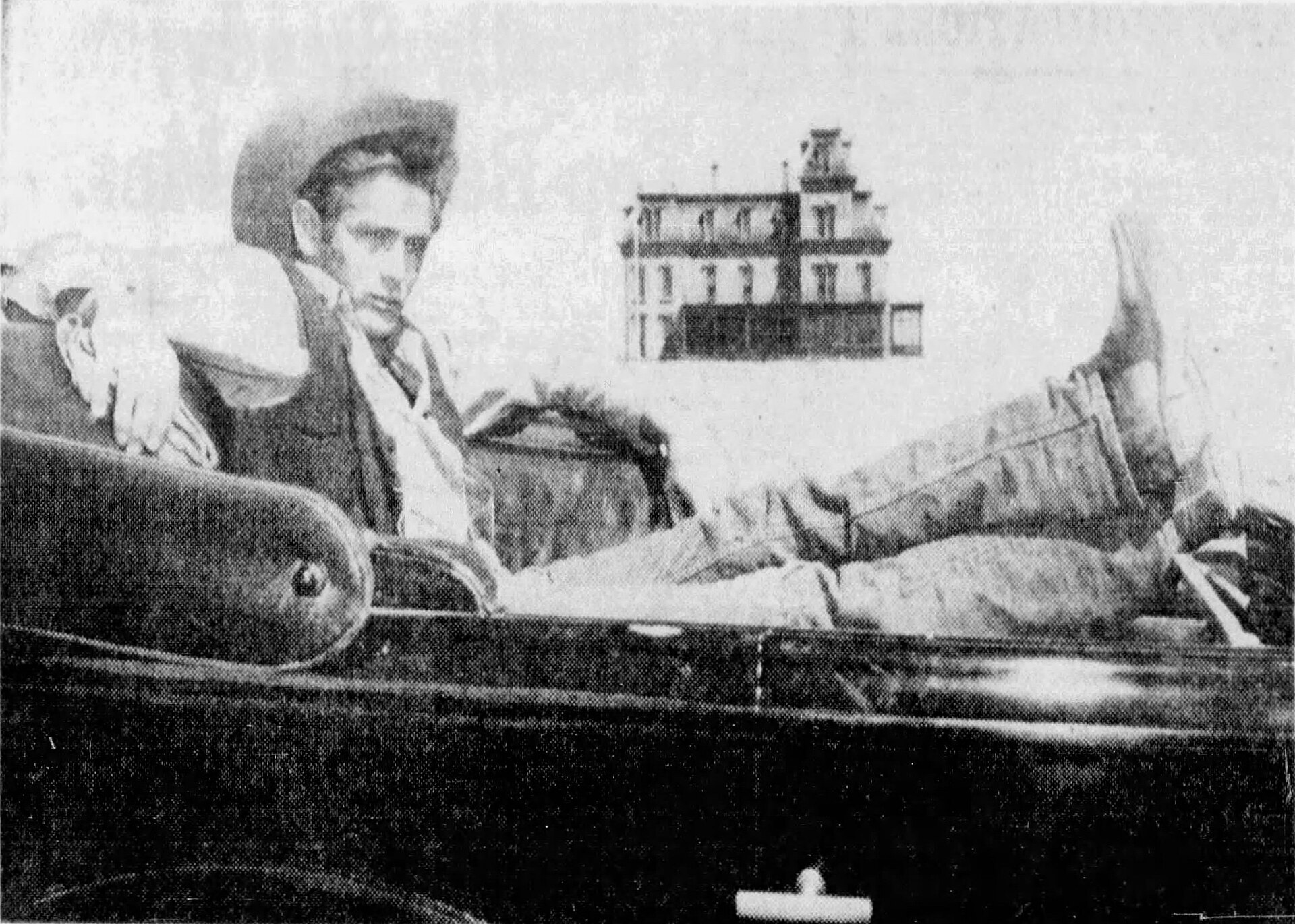 James Dean on the set of Giant in 1955