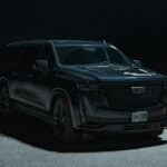 Black Cadillac Escalade IQ electric SUV parked outdoors