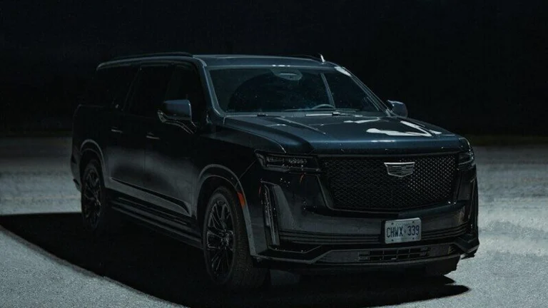 Black Cadillac Escalade IQ electric SUV parked outdoors