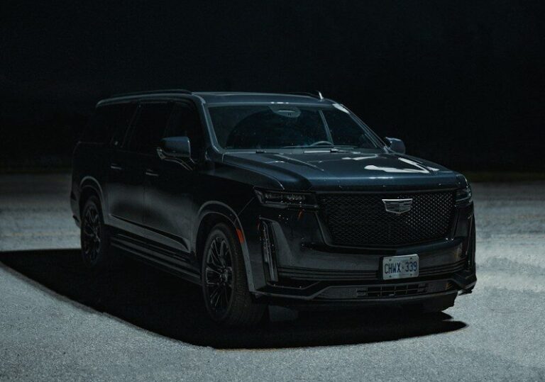 Black Cadillac Escalade IQ electric SUV parked outdoors