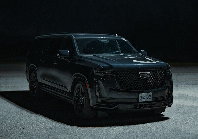 Black Cadillac Escalade IQ electric SUV parked outdoors