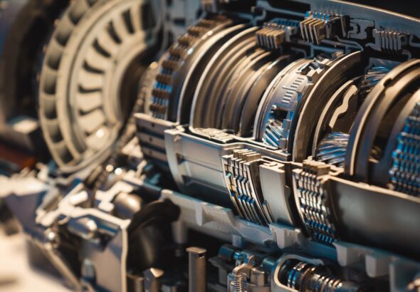 a close up of a machine with many gears