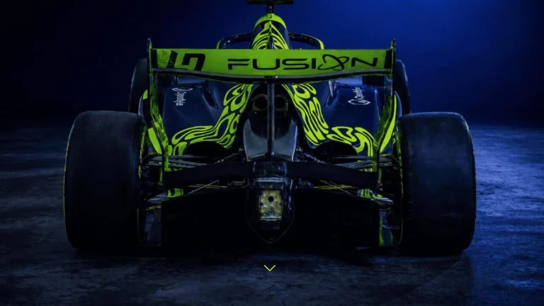 LN4 Fusion race car in the team's dark navy and neon green livery, rear three-quarter studio shot