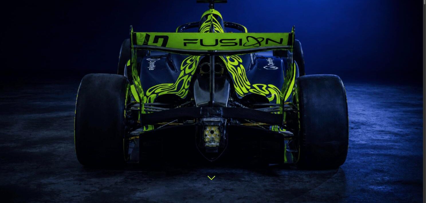LN4 Fusion race car in the team's dark navy and neon green livery, rear three-quarter studio shot