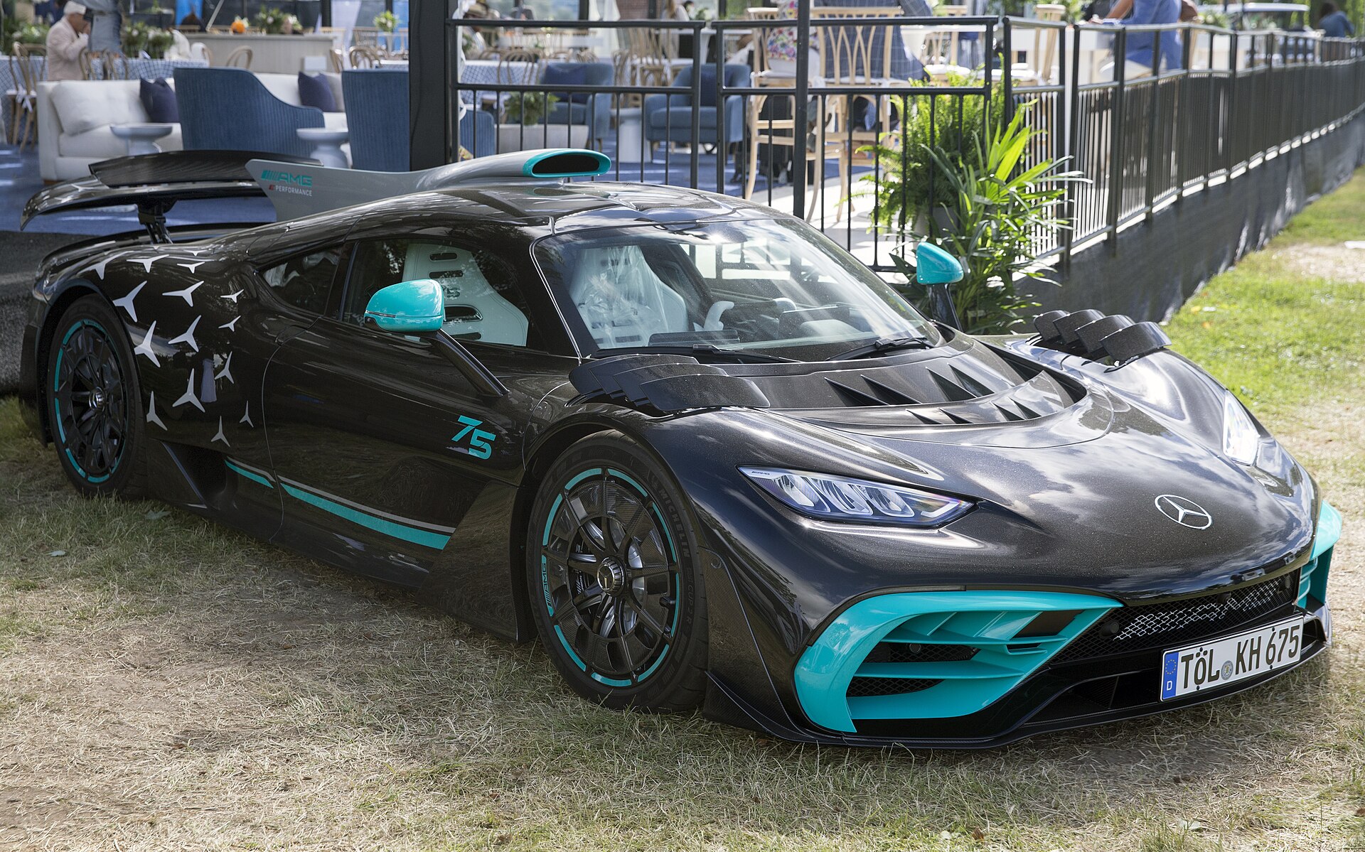 Black and turquoise Mercedes-AMG One, front left view