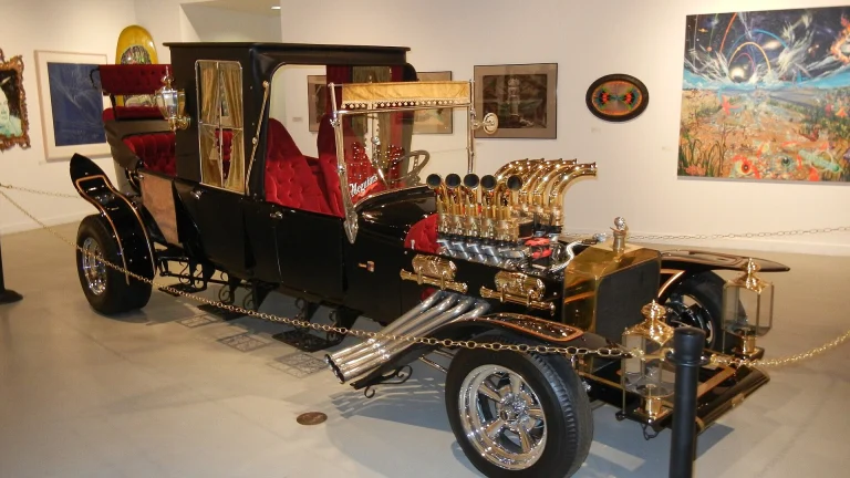 The Munster Koach, an 18-foot black hot rod hearse with gold scrollwork and a red velvet interior