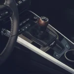 Six-speed manual shifter with walnut knob in the Porsche 911 Carrera S with MT Package