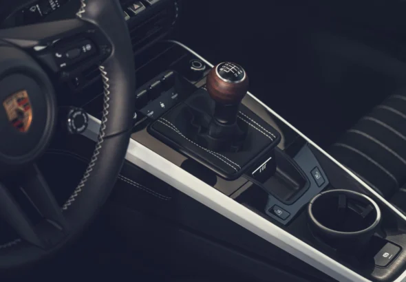 Six-speed manual shifter with walnut knob in the Porsche 911 Carrera S with MT Package