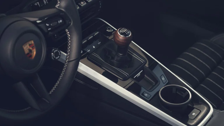 Six-speed manual shifter with walnut knob in the Porsche 911 Carrera S with MT Package