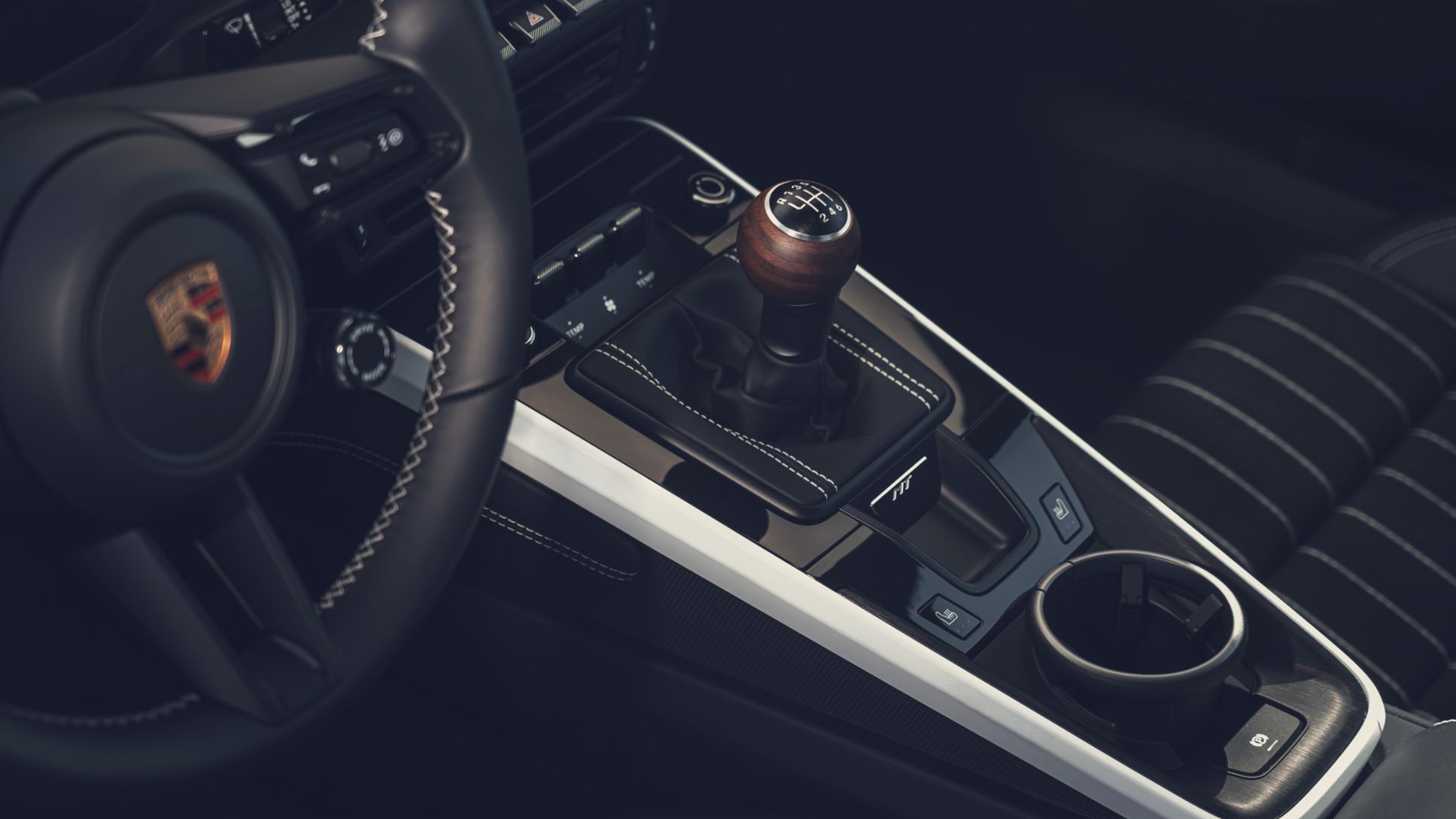 Six-speed manual shifter with walnut knob in the Porsche 911 Carrera S with MT Package