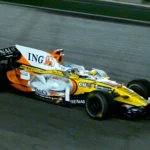 Fernando Alonso’s Renault R28 under the lights at the 2008 Singapore Grand Prix