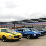 blue and yellow chevrolet camaro
