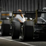 black and yellow f 1 car on road during daytime