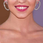 Portrait of Sydney Sweeney in a pink dress in 2019