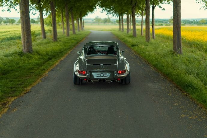 Rear view of the TECHART GTclassic showing LED taillights and centered exhaust