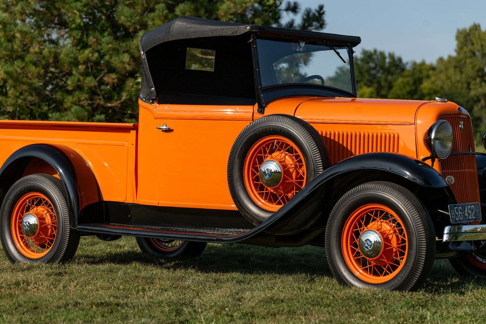 Three-quarter view of the restored 1933 Ford V8 Roadster Pickup and its open cab