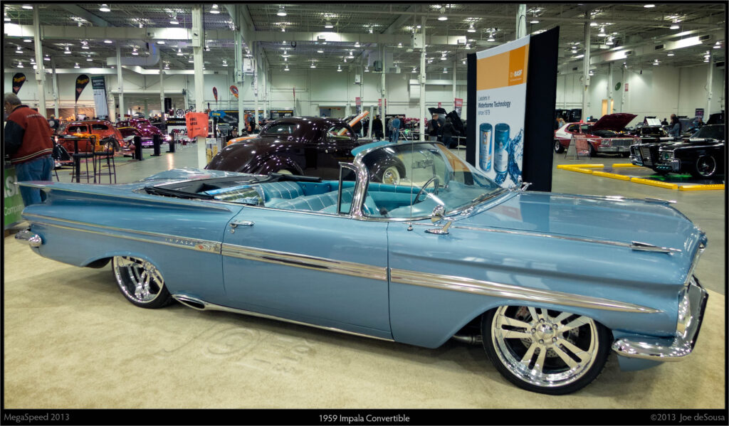 A 348 V8 with three two-barrel carburetors in a 1959 Chevrolet Impala convertible (representative image)